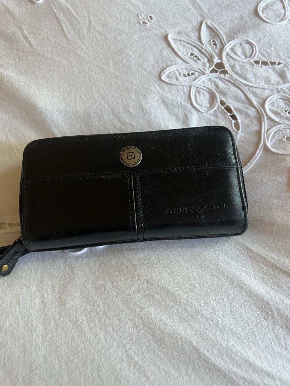 Stone Mountain Black Leather Clutch Wallet with Gold Emblem